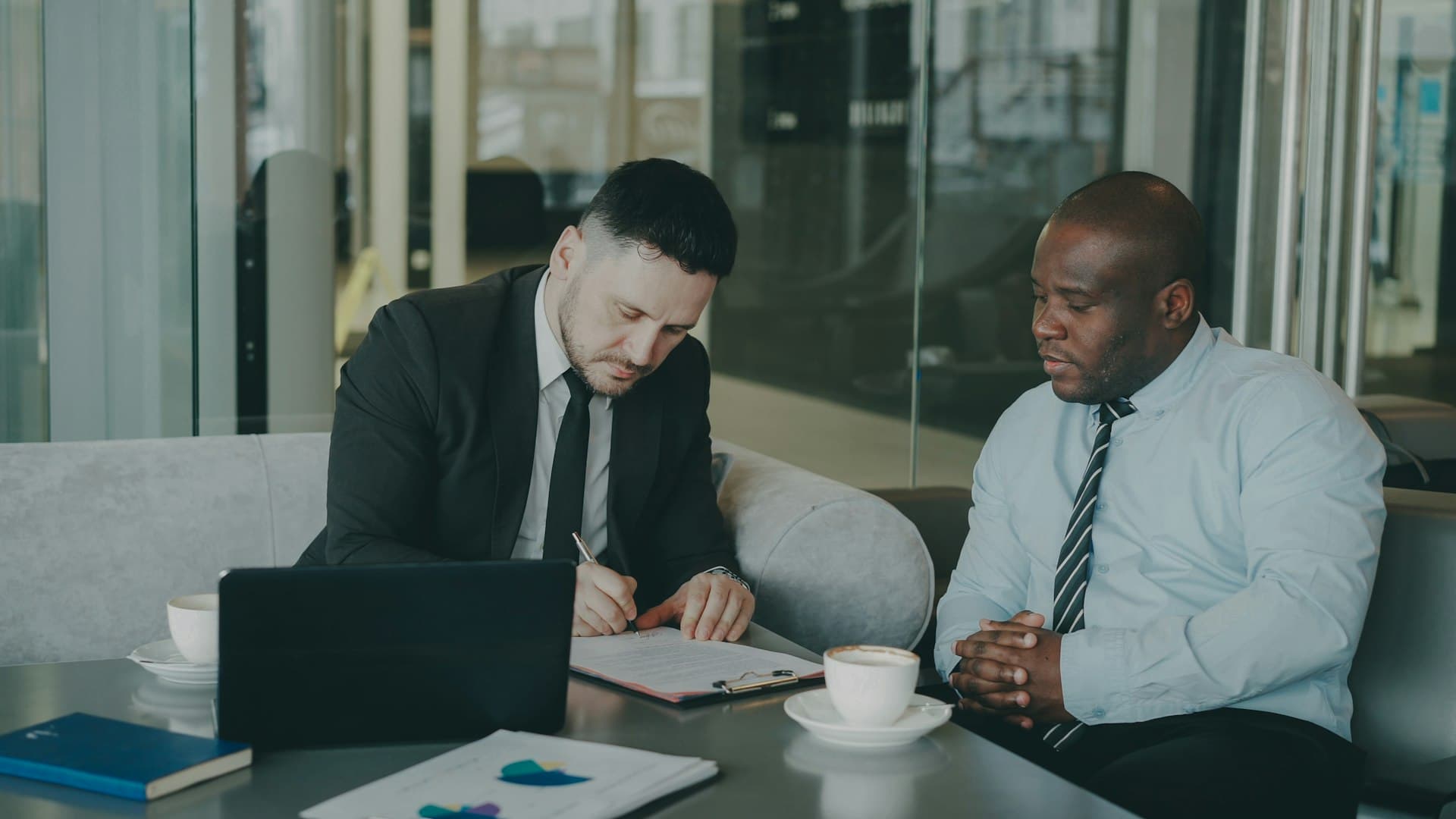 Person signing a contract representing contract services